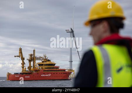 Seagreen, Scotland's largest offshore wind farm, in the North Sea, Scotland, on 3 September 2024.  “Seagreen has the deepest fixed bottom foundations of any wind farm in the world and was one of the largest construction projects ever undertaken in Scotland.  It is located around 27km off the coast of Angus in the North Sea and is a £3bn joint venture between SSE Renewables (49%), TotalEnergies (25.5%) and PTTEP (25.5%).” Stock Photo