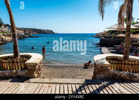 Rhodes, Greece July 7, 2024: Beach within the thermal springs Kallithea (Terme Kalithea) at Rhodes Island, Greece. Swimming is a popular attraction am Stock Photo