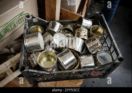 Non Exclusive: ZAPORIZHZHIA, UKRAINE - DECEMBER 17, 2024 - Tin cans are used to make trench candles, Zaporizhzhia, south-eastern Ukraine Stock Photo