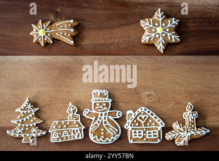 Festive Christmas Display of Homemade Gingerbread Cookies on a Rustic Wooden Background Stock Photo