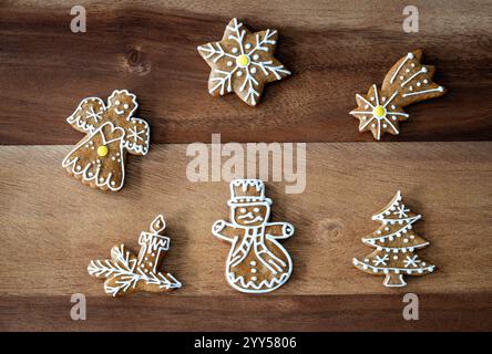 Festive Christmas Display of Homemade Gingerbread Cookies on a Rustic Wooden Background Stock Photo