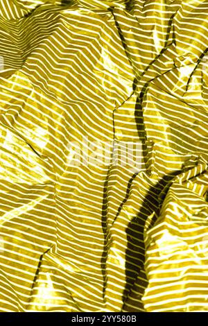 Sweet Wrapper Fine Stripes Lines on Plastic Paper Crumpled Warped Vertical or Horizontal Lined Background Stock Photo