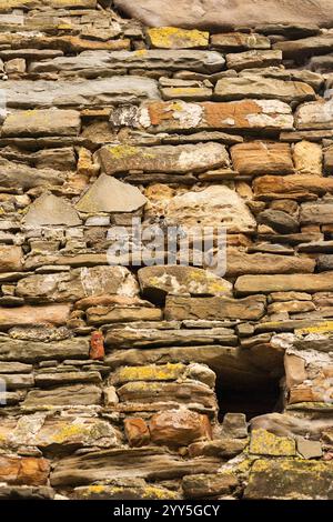 Striped and rectangular stone wall pattern, texture. Vertical photo. background and mapping Stock Photo