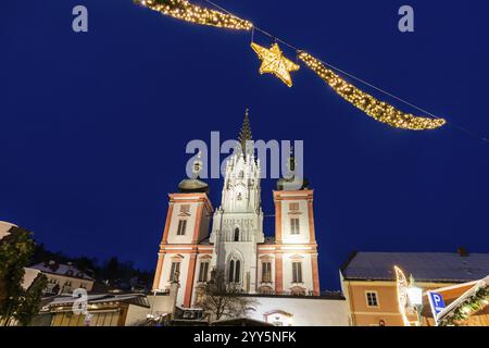 Advent atmosphere, facade of the basilica of Mariazell, blue hour in the early morning, Mariazell, Styria, Austria, Europe Stock Photo