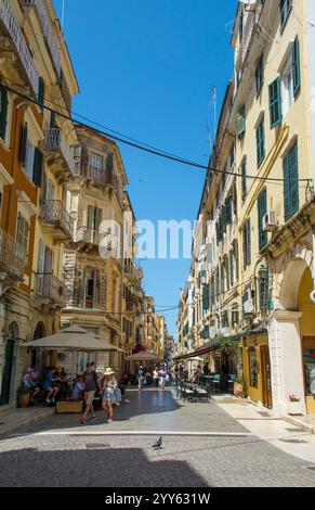 Corfu, Greece - June 6th 2024. Kapodistriou Street in Corfu Old Town, Greece. An elegant Venetian street lined with bars, restaurants and shops Stock Photo