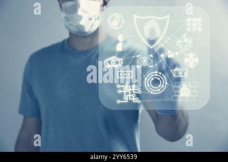 Doctor using virtual screen with different icons, closeup. Shield with fingerprint symbolizing medical privacy and confidentiality Stock Photo