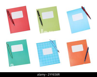 Set of many different notebooks and pens on white background, top view. School stationery Stock Photo