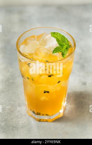 Cold Refreshing Passion Fruit Iced Tea with Mint Stock Photo