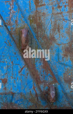 Close-up of rust on blue metal. Stock Photo