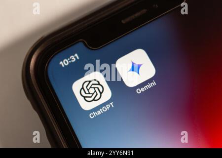 Mexico City, MEXICO - Dec 4 2024 : ChatGPT and Google Gemini icons are displayed on an iPhone. Stock Photo