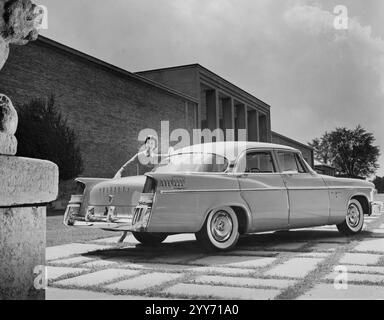 October 11,1955: The Chrysler New Yorker for 1956 offers new flight swept read fenders which emphasize the low, slim, taut lines of the car. It features a new 280 horsepower FirePower V8 engine, fully automatic push button drive, new center plane brakes and super safe LifeGuard door latches as standard equipment. Chrysler New Yorkers are available in a new four door hardtop, six passenger sedan, Newport hardtop, St. Regis hardtop, convertible coupe, and Town and Country Wagon: (A Credit Image: © Keystone Press Agency/ZUMA Press Wire) EDITORIAL USAGE ONLY! Not for Commercial USAGE! Stock Photo