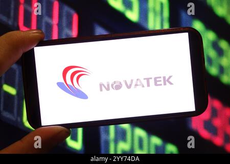 In this photo illustration, the Novatek company logo is seen displayed on a smartphone screen. Stock Photo