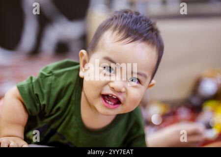 Cute Baby Boy with a Playful Expression. Happy and Playful Asian Baby Boy. Stock Photo