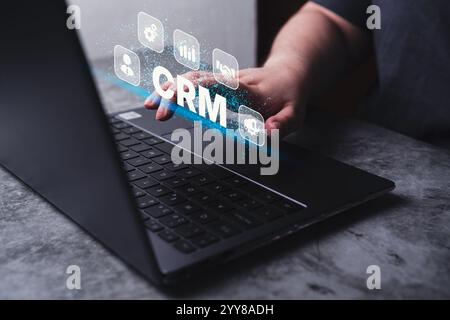 Customer relationship management concept. Retention strategies. CRM or customer loyalty program. Woman use laptop for CRM. Stock Photo