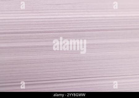 white sheets of paper are used for printing or writing, close-up of a piece of new pulp paper Stock Photo