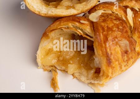 pastries with apple and cinnamon, freshly baked wheat bun with filling and with cinnamon Stock Photo