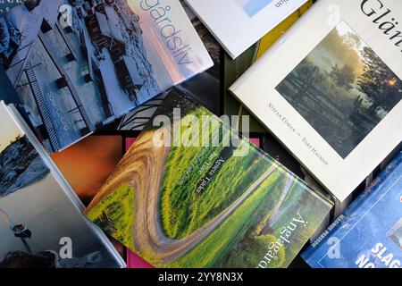Stockholm, Sweden - December 20, 2024: Pile of several coffee table books Stock Photo