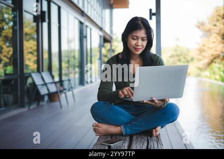Business concept. Working away from the office. Businessman analyzing company performance graph to generate profit and growth, Businesswoman typing on Stock Photo