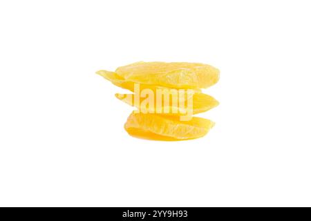 Slices of large sweet dried mangoes isolated on white. Stock Photo