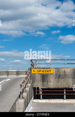 Up and exit sign on a rooftop car park Stock Photo