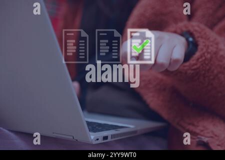 Document management concept, project approve. Businesswoman working from home using laptop to do paperless online approval for business process workfl Stock Photo