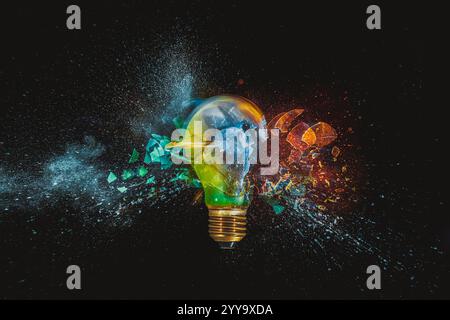 Multicolored light bulb exploding  black background, creative energy Stock Photo