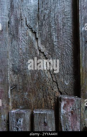 Detail of an old wall made with pieces of wood. It has many textures. Nice image for backgrounds Stock Photo