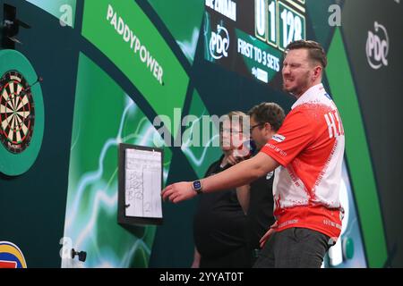 Alexandra Palace, London, UK. 20th Dec, 2024. 2024/25 PDC Paddy Power World Darts Championships Day 6; Florian Hempel reacts after missing a checkout during his match against Jeffrey De Zwaan. Credit: Action Plus Sports/Alamy Live News Stock Photo