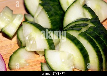 Close up of Chopped Tomatoes on a Wooden Chopping Board Stock Photo