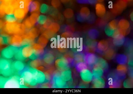 Points of multicolored light in a blurred abstract background Stock Photo