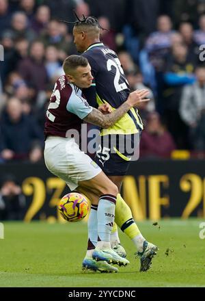 Cardiff, UK. 21st Dec, 2024. Manuel Akanji of Manchester City tussles with Aston Villa's Lucas Digne during the Sky Bet Championship match at the Cardiff City Stadium, Cardiff. Picture credit should read: Ashley Crowden/Sportimage Credit: Sportimage Ltd/Alamy Live News Stock Photo