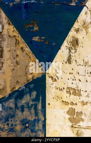 Abstract Chipped Paint Art on Aged and Weathered Wall Surface Stock Photo