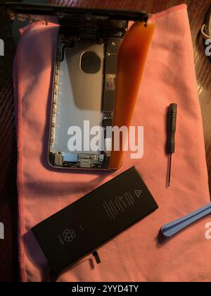 Disassembled smartphone case during repair. Stock Photo