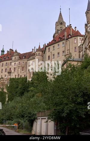 Majestic Sigmaringen Castle Perched on Rugged Cliff Above Tranquil Danube: Historic Hohenzollern Residence Showcases Medieval Architecture and Royal Stock Photo