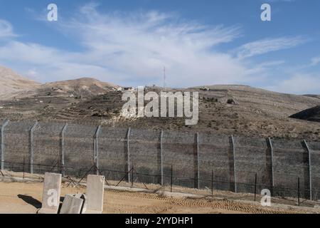 Majdal Shams, Israel. 20th Dec, 2024. A view of the Israeli fence on the border with Syria, adjacent to the Druze village of Majdal Shams, located in the Israeli controlled Golan Heights. Credit: Nir Alon/Alamy Live News Stock Photo