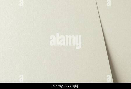 Pale greenish champagne paper texture with a soft, organic finish in light green, gray, and beige tones. The subtle pearlescent sheen and matte satin Stock Photo