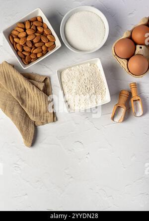 Blank photography of Biscotti ingredients; Italian biscuits with whole almonds, wheat flour; sugar; salt; baking powder, eggs, raw, uncooked, dough, b Stock Photo