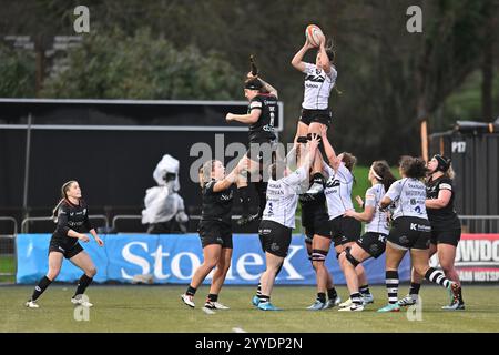 Bristol Bears' Alisha Joyce-Butchers (centre) is tackled by Gloucester ...