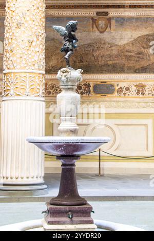 Cherub statue fountain situated in the courtyard of  Palazzo Vecchio in Florence, Italy Stock Photo