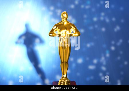 Golden trophy in shape of human figure in light ray against blue shimmering background Stock Photo