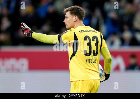 Sinsheim, Deutschland. 21st Dec, 2024. Moritz Nicolas (Torhüter, Torwart, BMG, 33), am Ball, Einzelbild, Einzelfoto, Aktion, Action, 21.12.2024, Sinsheim (Deutschland), Fussball, Bundesliga, TSG 1899 Hoffenheim - Borussia Mönchengladbach, DFB/DFL REGULATIONS PROHIBIT ANY USE OF PHOTOGRAPHS AS IMAGE SEQUENCES AND/OR QUASI-VIDEO. Credit: dpa/Alamy Live News Stock Photo