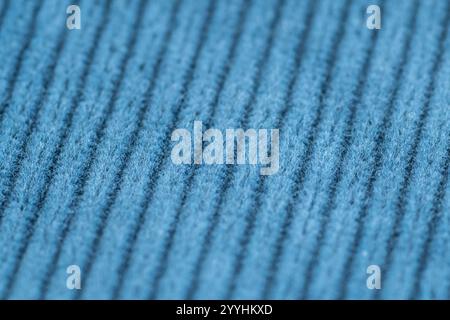 Blue textured corduroy fabric patterns closeup as textile background Stock Photo