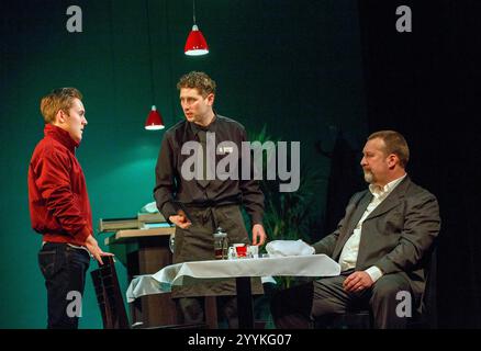 l-r: Oliver Coopersmith (Carl), Cary Crankson (Mugsy), Ian Burfield (Ash) in DEALER'S CHOICE by Patrick Marber at the Theatre Royal, Royal & Derngate, Northampton, England  27/05/2014  design: Helen Goddard   lighting: Katharine Williams   director: Michael Longhurst Stock Photo