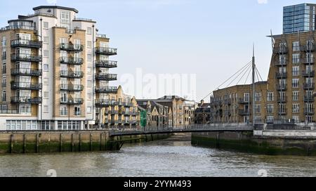 Residential property on the banks of the Thames near Canary Whatf London Stock Photo