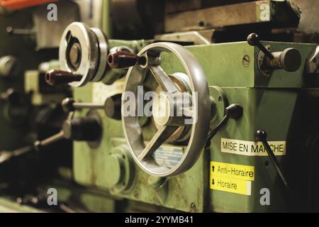 Old conventionnal lathe in a mechanical workshop Stock Photo