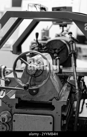 Old conventionnal lathe in a mechanical workshop Stock Photo