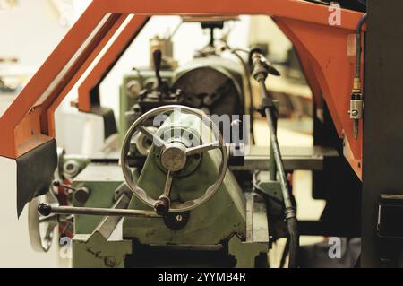 Old conventionnal lathe in a mechanical workshop Stock Photo
