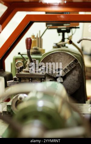 Old conventionnal lathe in a mechanical workshop Stock Photo