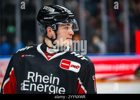 Germany. 22nd Dec, 2024. Eishockey Penny-DEL 29.Spieltag Koelner Haie - Straubing Tigers am 22.12.2024 in der Lanxess Arena in Koeln Justin Schuetz ( Koeln ) Gemaess den Vorgaben der DEL Deutsche Eishockey Liga ist die Publikation und Weiterverwertung der Aufnahmen in elektronischen Medien und Endgeraeten aller Art waehrend des laufenden Spiels nicht zulaessig. Foto: Revierfoto Credit: ddp media GmbH/Alamy Live News Stock Photo