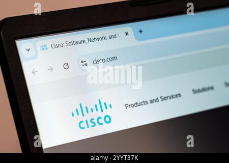 New York, USA - December 21, 2024: Cisco website homepage displayed on laptop screen with logo. Technology company specializing in networking Stock Photo